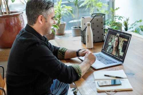 A couple chatting on video call to cope up with the long distance